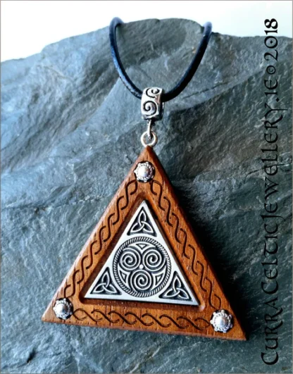 Black Walnut with fine pewter inlay featuring Triskele and Celtic knotwork - Unisex.